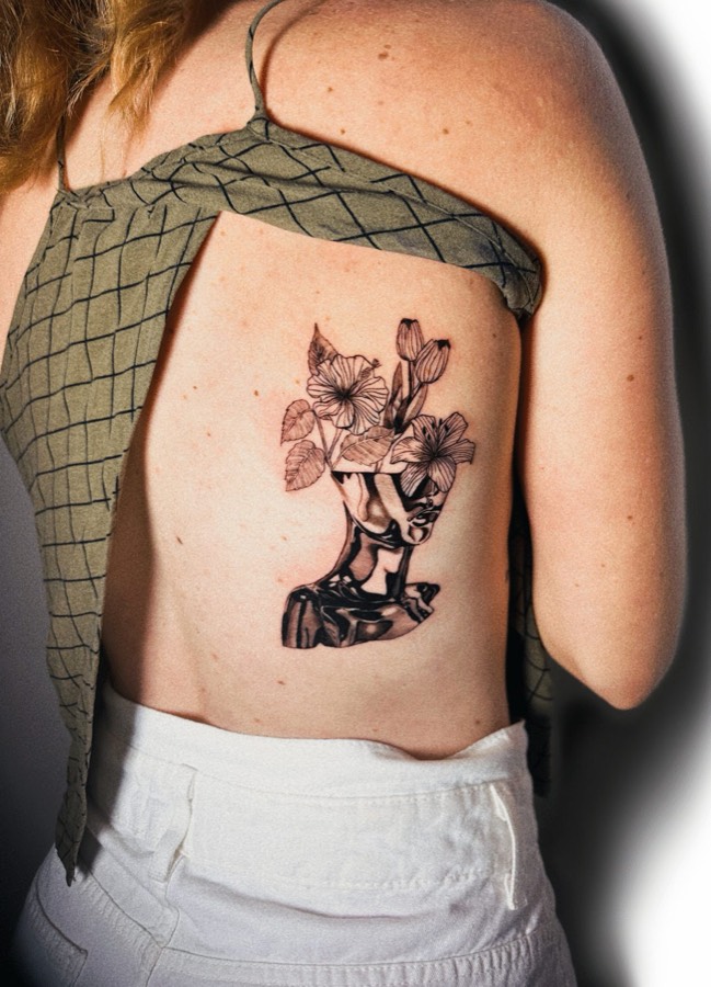 Tatuagem Rosto surrealista feita por Leonardo Fonseca em São Luís – MA